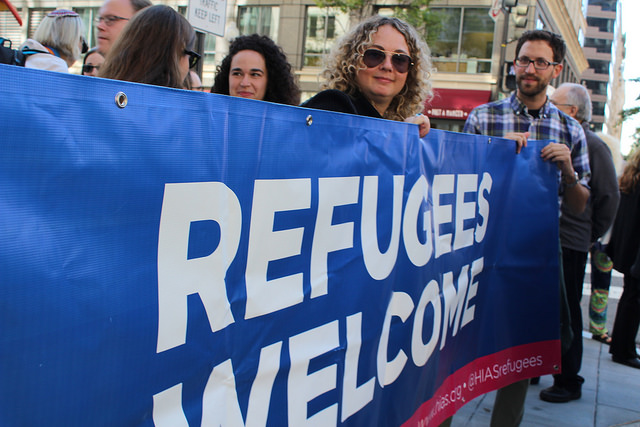 Refugees Welcome banner at a protest 