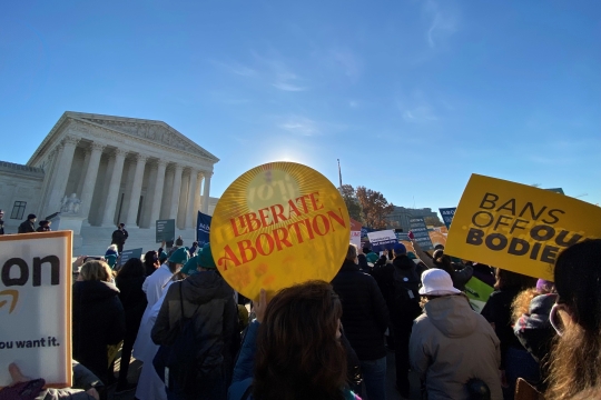 abortion rights rally people holding signs